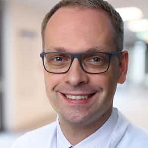 Dr. med. Arne Macher, [object Object]